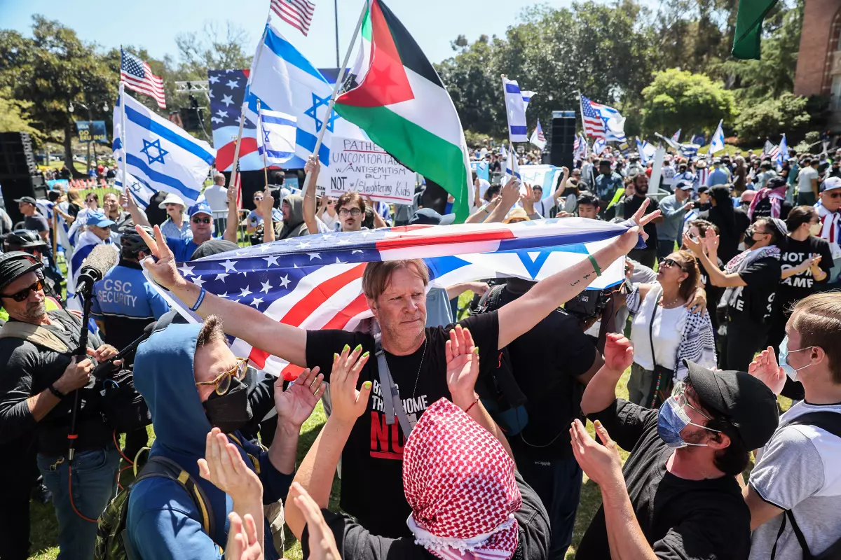 Pro-Israel protesters are confronted by pro-Palestinian protesters at UCLA.
